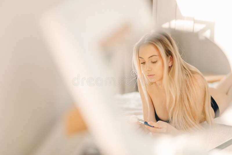 Well-rested Blonde Woman Enjoying Happy Morning, Stretching in Bed, Smiling  Stock Photo - Image of sitting, blonde: 248037500