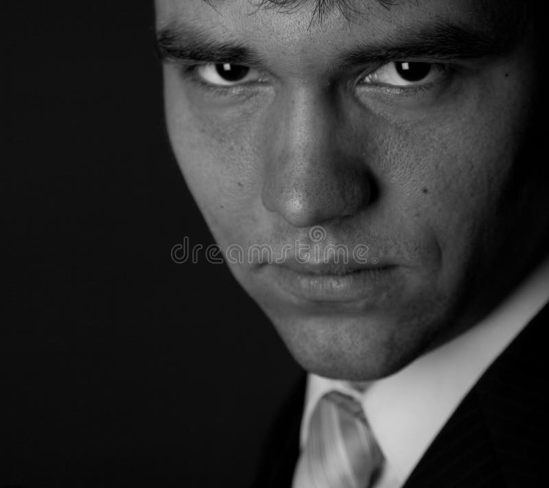 Portrait of a young serious businessman
