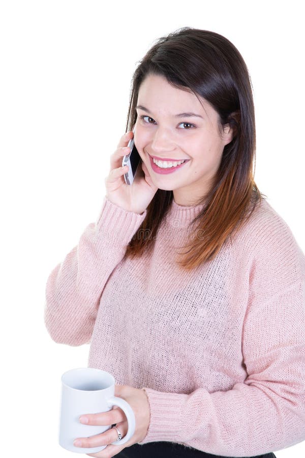 Portrait of young smiling brunette woman with mobile phone looking side stock photo Portrait of young smiling brunette woman with mobile phone looking side stock photo