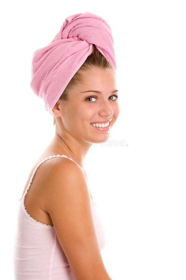 Young woman with hair wrapped in towel