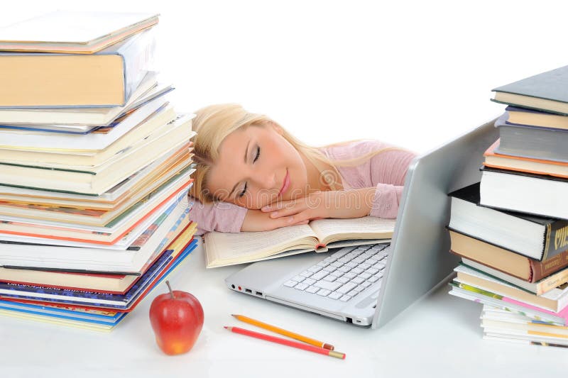 Portrait of young student girl with lots of books