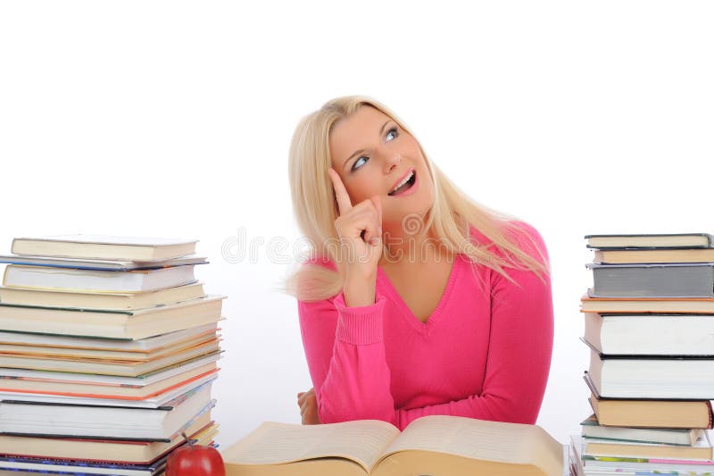 Portrait of young student girl with lots of books