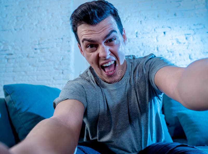 Close Up Portrait Of Young Man Playing Video Game At Night Addicted To ...