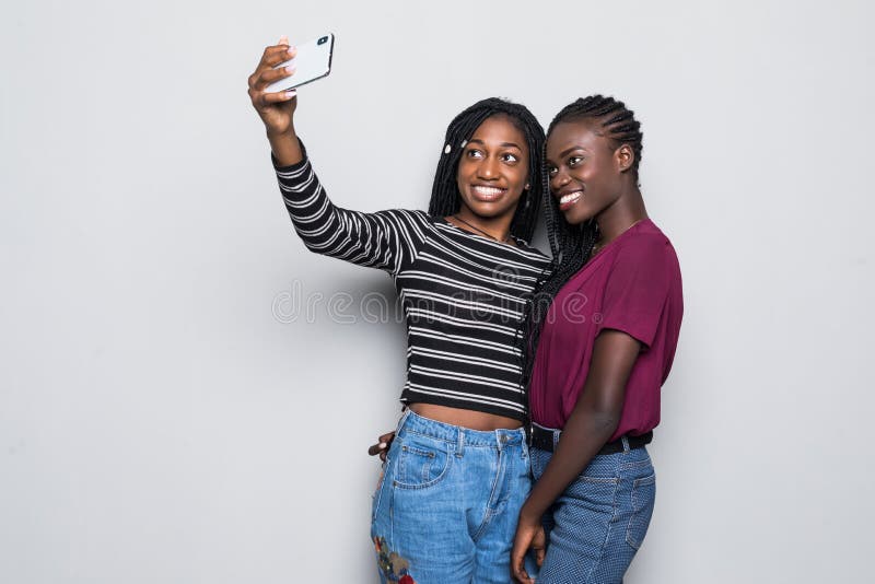 Portrait of Young Two African Young Girls Taking Selfie on Smartphone ...