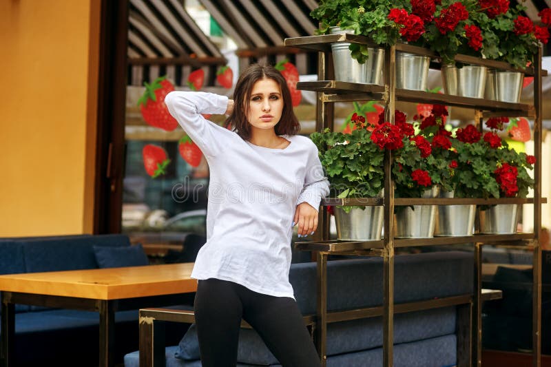 Portrait of a young woman on a city street stock images Portrait of a young woman on a city street stock images