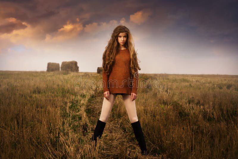 Portrait of young woman in countryside