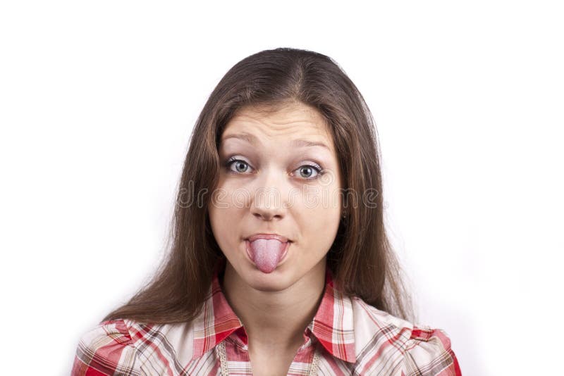 Young Brunette Woman with Her Tongue Out Stock Photo - Image of ...