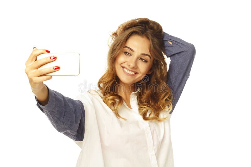 Portrait Of A Beautiful Young Woman Making Selfie On Smart Phone Stock