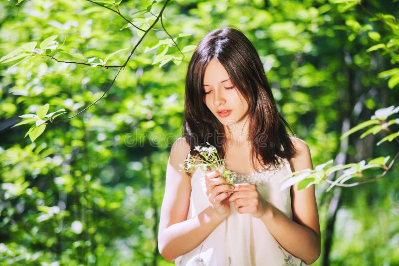 Portrait of Young Woman on Natural Green Background. Stock Image ...