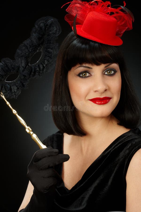 Portrait of young woman in red hat