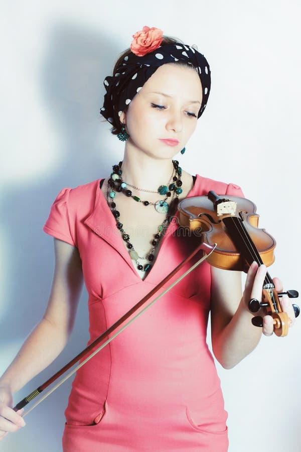 portrait of young woman with violin royalty free stock photo portrait of young woman with violin royalty free stock photo