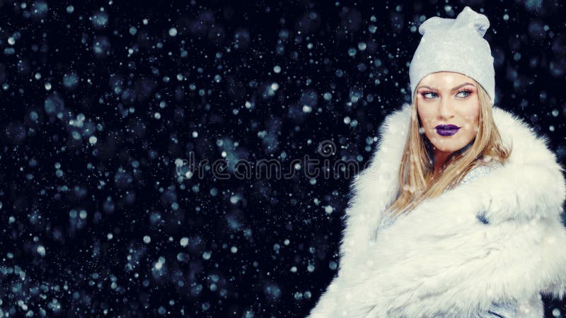 Portrait of young woman in wintertime outdoor Christmas stock photo Portrait of young woman in wintertime outdoor Christmas stock photo