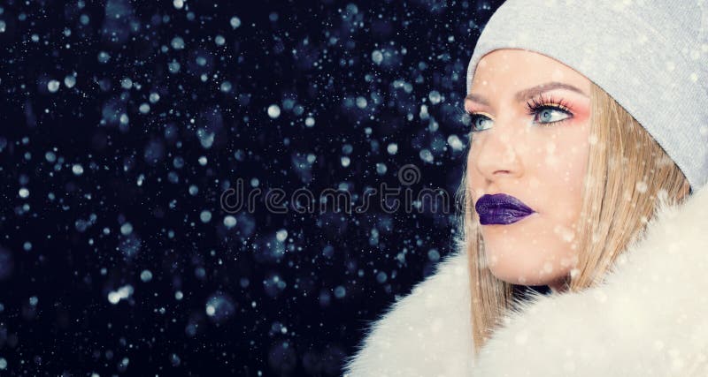 Portrait of young woman in wintertime outdoor Christmas stock photos Portrait of young woman in wintertime outdoor Christmas stock photos