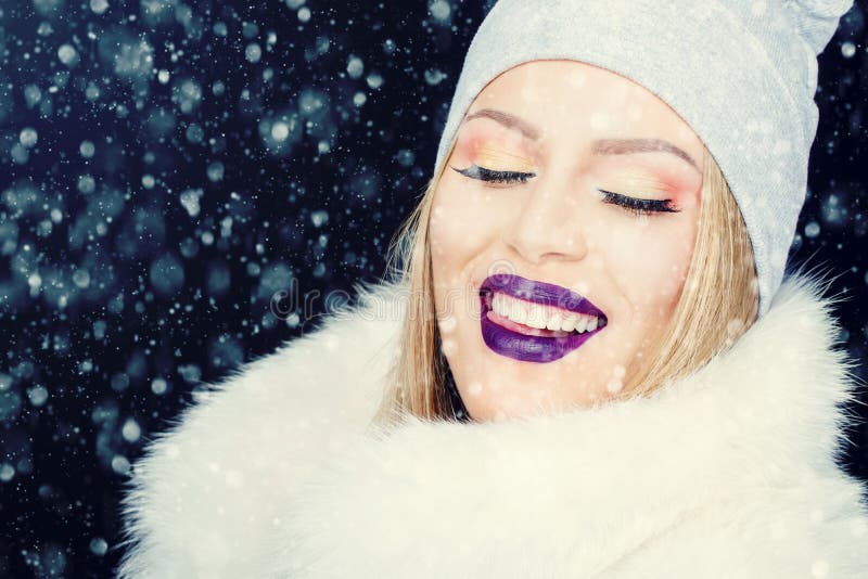 Portrait of young woman in wintertime outdoor Christmas stock photos Portrait of young woman in wintertime outdoor Christmas stock photos