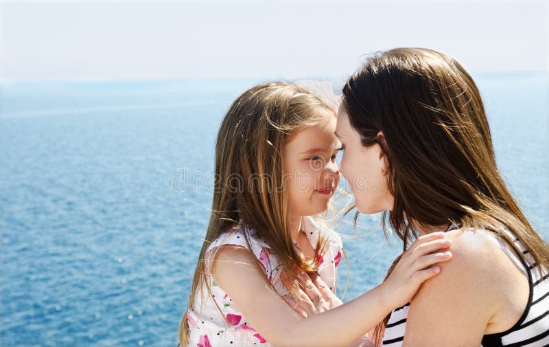 Portrait of young women with her daughter