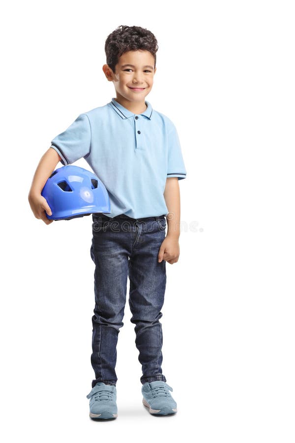 Portret de lungime completă al unui băiat care deține o cască de bicicletă stock photo