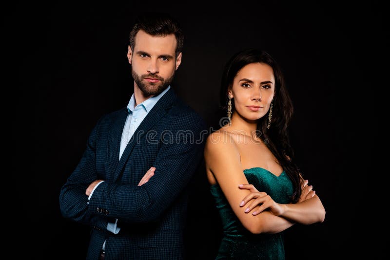 Portrait of his he her she nice-looking well-dressed attractive luxurious brandy, content successful rich wealthy people standing back to back folded arms isolated over black background. Portrait of his he her she nice-looking well-dressed attractive luxurious brandy, content successful rich wealthy people standing back to back folded arms isolated over black background