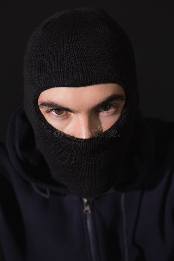 Portret jest ubranym balaclava włamywacz zdjęcie stock