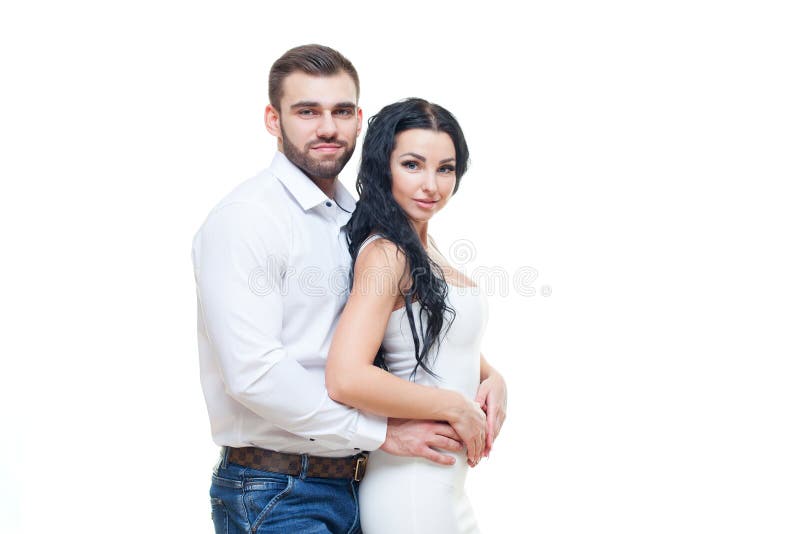 Portret piękna uśmiechnięta para pozuje przy studiiem nad białym tłem (Kerrii Hoya) Walentynka dnia temat fotografia stock Portret piękna uśmiechnięta para pozuje przy studiiem nad białym tłem (Kerrii Hoya) Walentynka dnia temat fotografia stock
