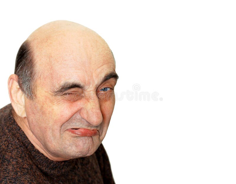 Stary człowiek z grymasem na jego twarzy fotografia stock Stary człowiek z grymasem na jego twarzy fotografia stock