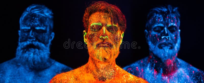 Portret trzy brodatego mężczyzny malował w fluorescencyjnych proszkach zdjęcie royalty free Portret trzy brodatego mężczyzny malował w fluorescencyjnych proszkach zdjęcie royalty free