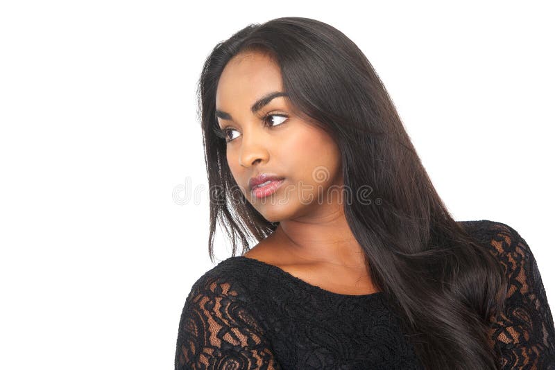 Closeup portrait of a beautiful young woman looking away. Closeup portrait of a beautiful young woman looking away