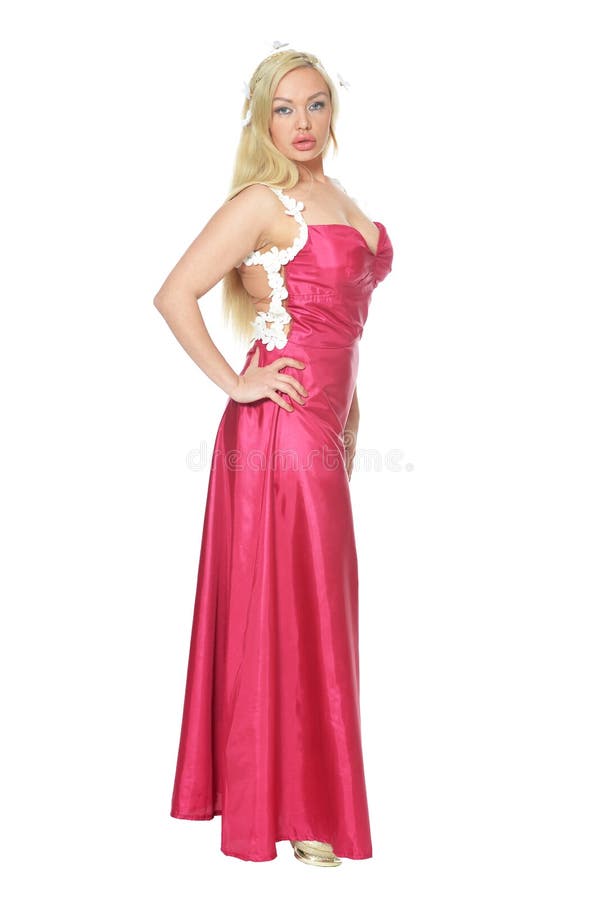 Portret van een mooie vrouw in het roze kleding stellen stock afbeelding Portret van een mooie vrouw in het roze kleding stellen stock afbeelding