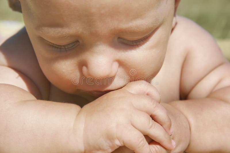 Close up portrait of a thoughtful baby. Close up portrait of a thoughtful baby