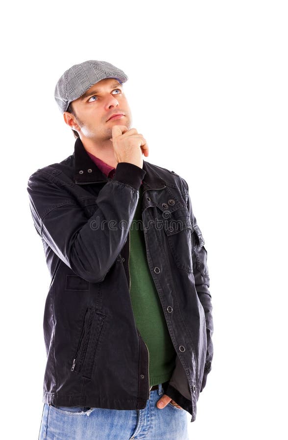 Portret van een nadenkende jonge mens die met hand op kin omhoog kijken stock afbeelding Portret van een nadenkende jonge mens die met hand op kin omhoog kijken stock afbeelding
