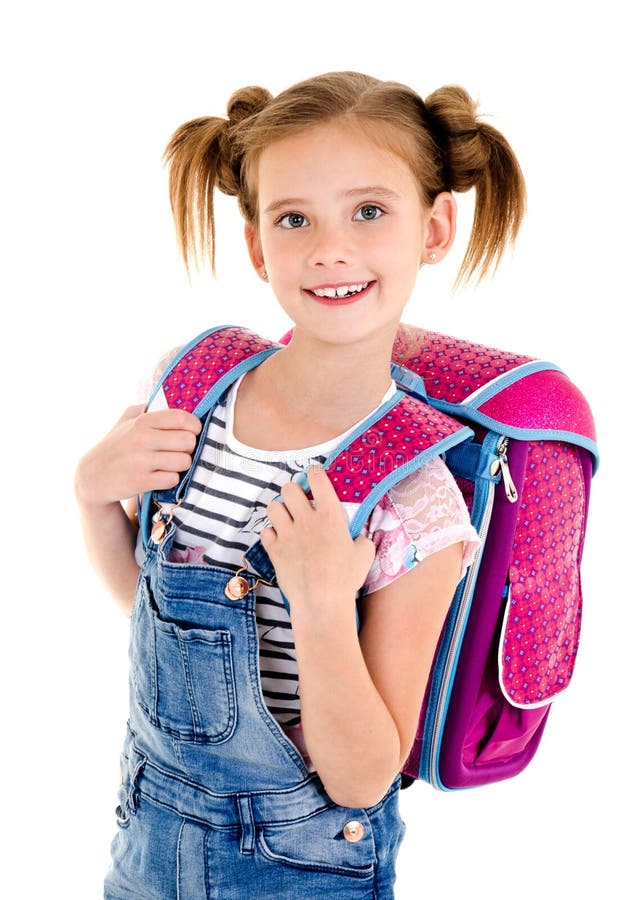 Portret van het glimlachende gelukkige kind van het schoolmeisje met schooltasisol stock fotografie Portret van het glimlachende gelukkige kind van het schoolmeisje met schooltasisol stock fotografie