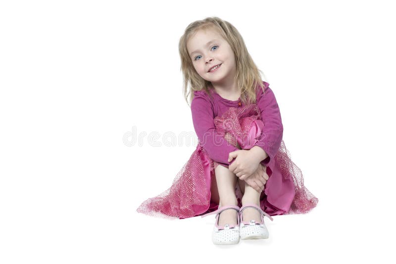 Portret van meisjeszitting op de vloer royalty-vrije stock afbeelding Portret van meisjeszitting op de vloer royalty-vrije stock afbeelding