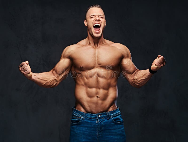 Portret van shirtless spiermannetje in jeans royalty-vrije stock foto Portret van shirtless spiermannetje in jeans royalty-vrije stock foto