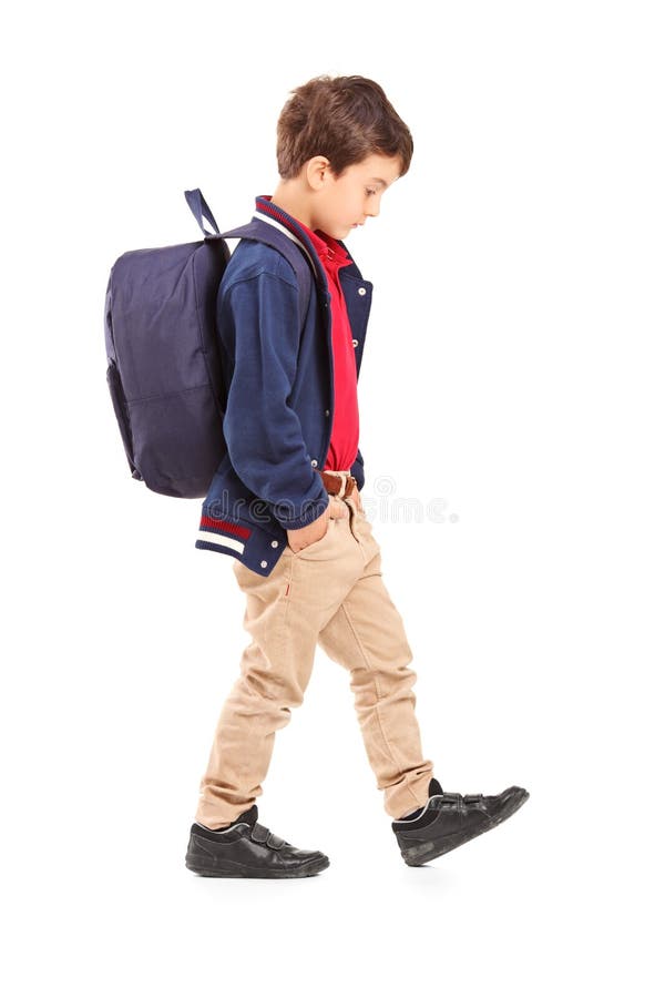 Portretul unui băiat trist care merge pe jos stock photos