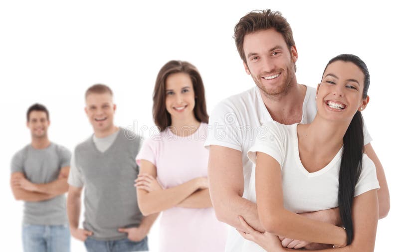 Group portrait of happy young people together, looking at camera, smiling. Group portrait of happy young people together, looking at camera, smiling.