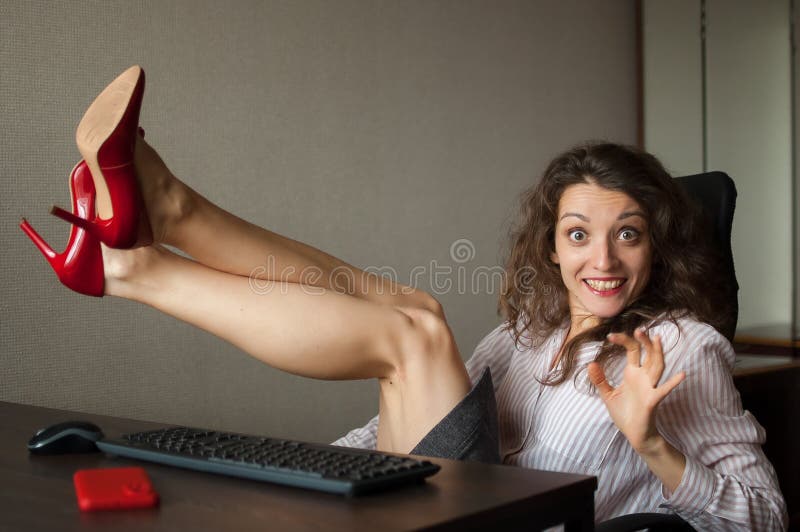 Portriat of Brunette with Legs on Office Table with Laptop, Hot Woman in  Red Shoes on High Heels Sitting at the Desk Stock Image - Image of desire,  desk: 238969175