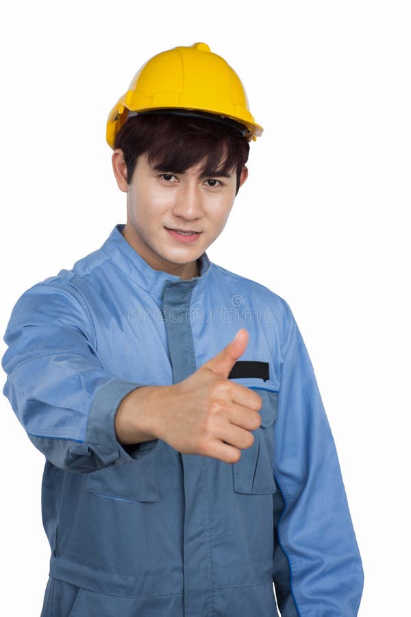 Porträt des jungen Bauarbeiters gelben Sturzhelm in einem einheitlichen Mechaniker tragend lizenzfreie stockfotos Porträt des jungen Bauarbeiters gelben Sturzhelm in einem einheitlichen Mechaniker tragend lizenzfreie stockfotos