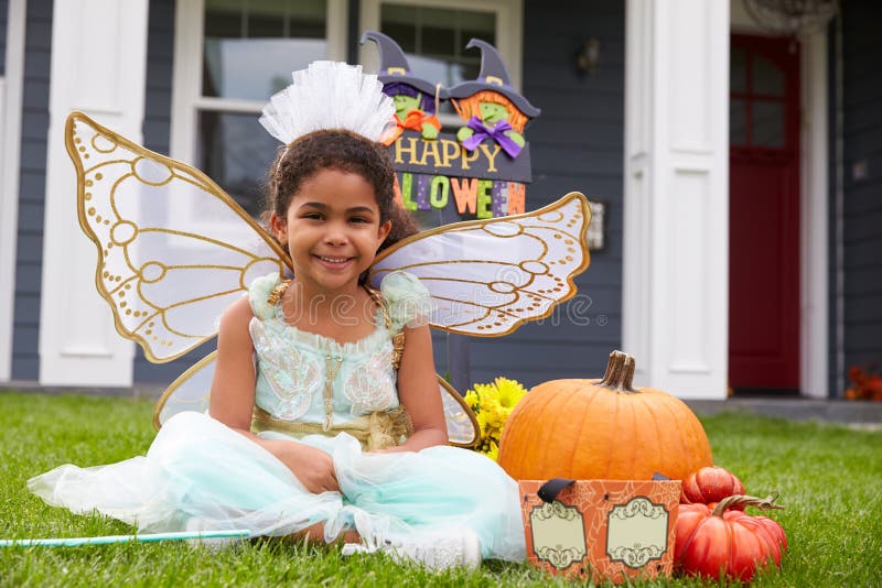 Portrait Of Girl Dressed In Trick Or Treating Fairy Costume. Portrait Of Girl Dressed In Trick Or Treating Fairy Costume