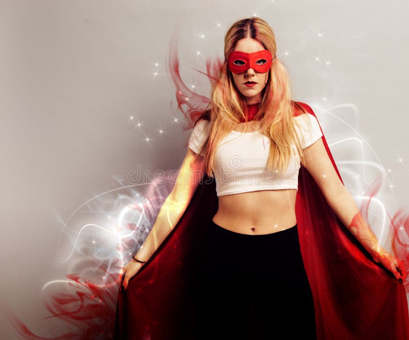 Portrait of a young woman dressed as superhero. Portrait of a young woman dressed as superhero