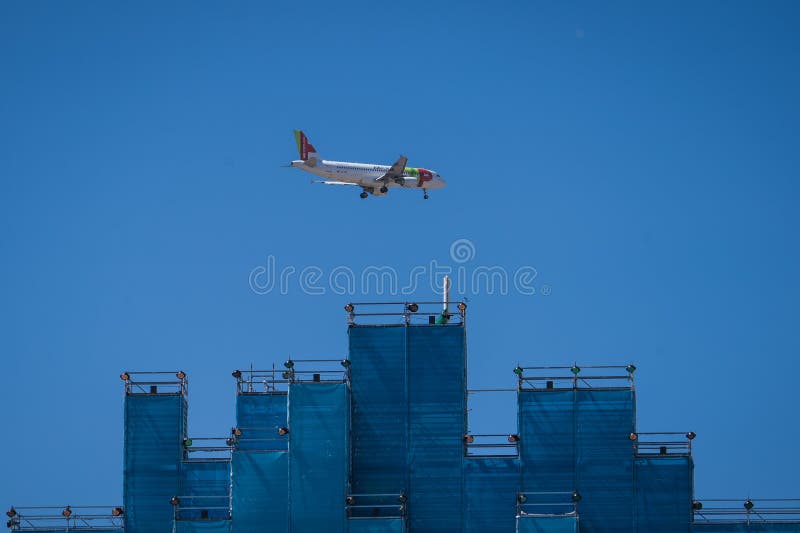 Portuguese plane and papal altar in Lisbon's Edward VII Park during World Youth Day 2023. 11th anniversary of the election of Pope Francis to the Saint Peter. Portuguese plane and papal altar in Lisbon's Edward VII Park during World Youth Day 2023. 11th anniversary of the election of Pope Francis to the Saint Peter.