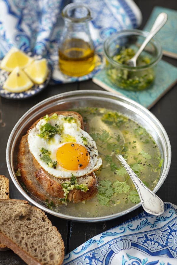 Portuguese Garlic Soup with Bread and Egg, Sopa Alentejana Stock Image ...