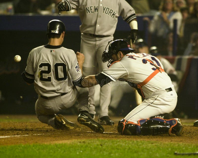 Catcher Jorge Posada slides safely into home plater scoring the go ahead run in Game 5 of the 2000 World Series. (Image taken from color slide.). Catcher Jorge Posada slides safely into home plater scoring the go ahead run in Game 5 of the 2000 World Series. (Image taken from color slide.)