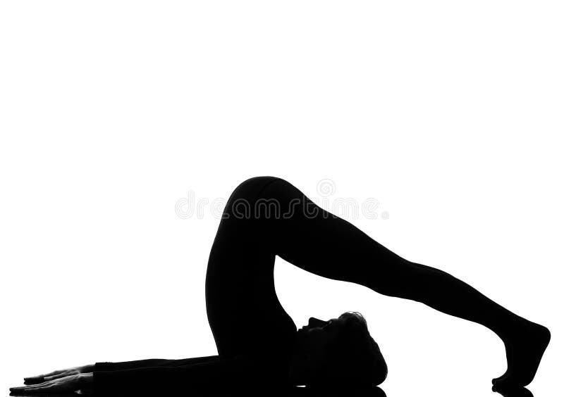 Pose da ioga do carrinho do ombro do halasana da mulher imagem de stock royalty free Pose da ioga do carrinho do ombro do halasana da mulher imagem de stock royalty free