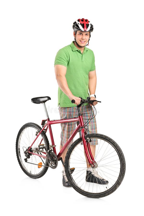 Full length portrait of a smiling man posing with a mountain bike isolated on white background. Full length portrait of a smiling man posing with a mountain bike isolated on white background