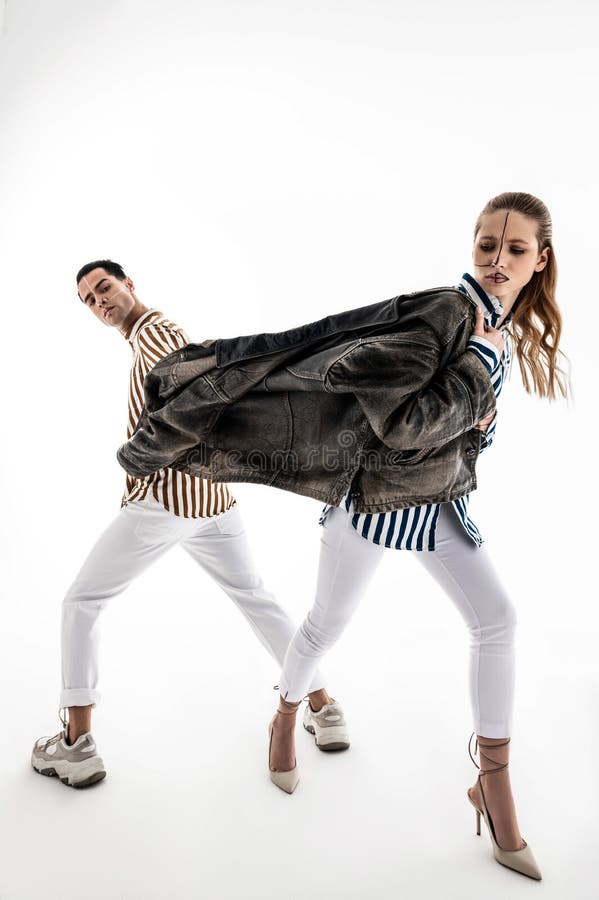 Male And Female Models Having Blindfolds And Lines On Face Stock