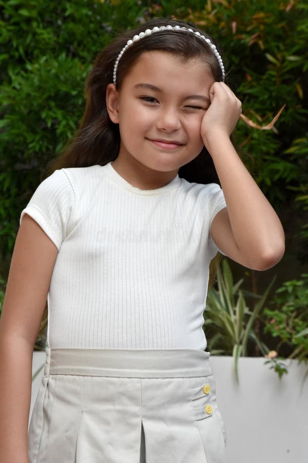 A Posing Young Diverse Female royalty free stock photography