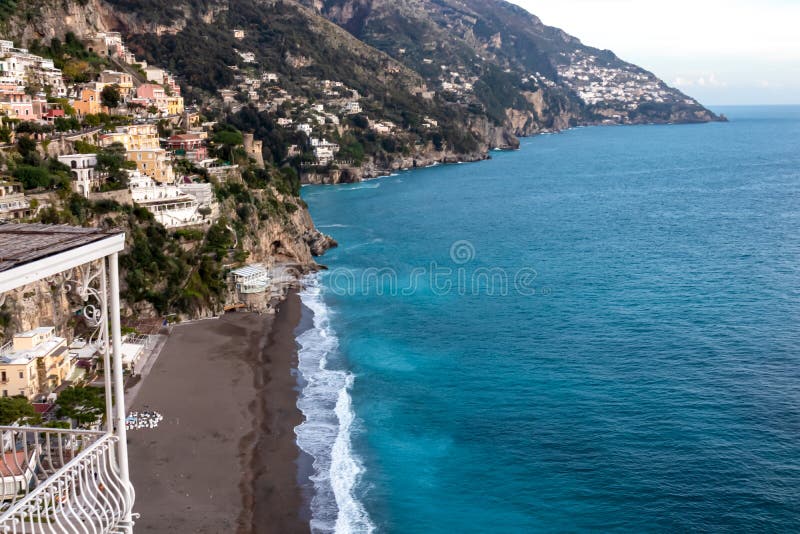 Positano - Scenic view of the sandy Fornillo Beach and colorful buildings of village Positano at Amalfi Coast, Italy