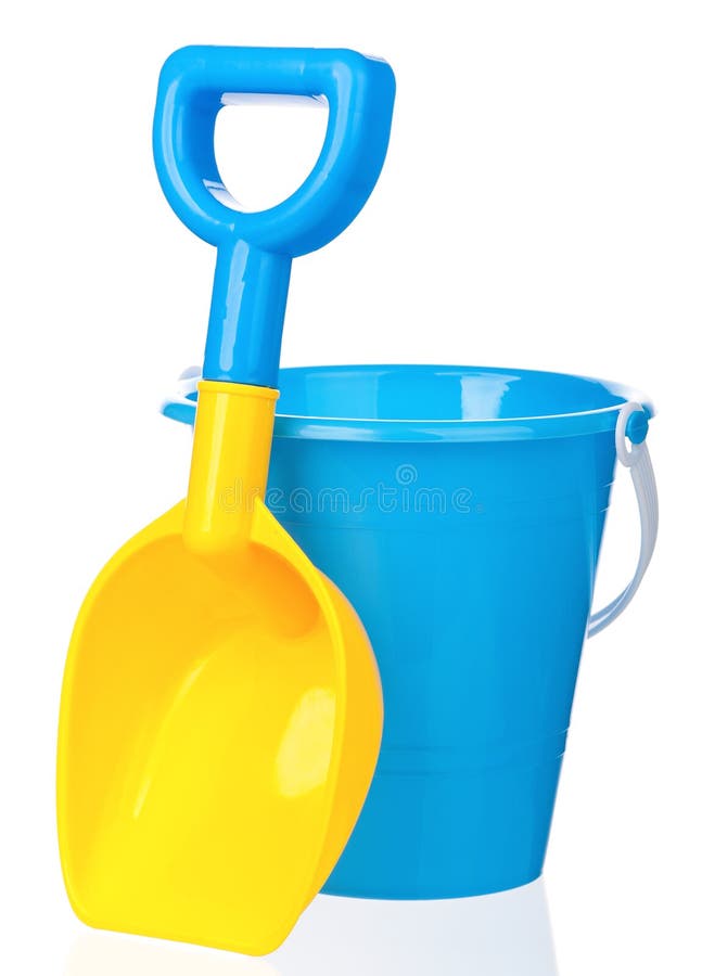 Toy bucket and spade isolated on white background. Toy bucket and spade isolated on white background