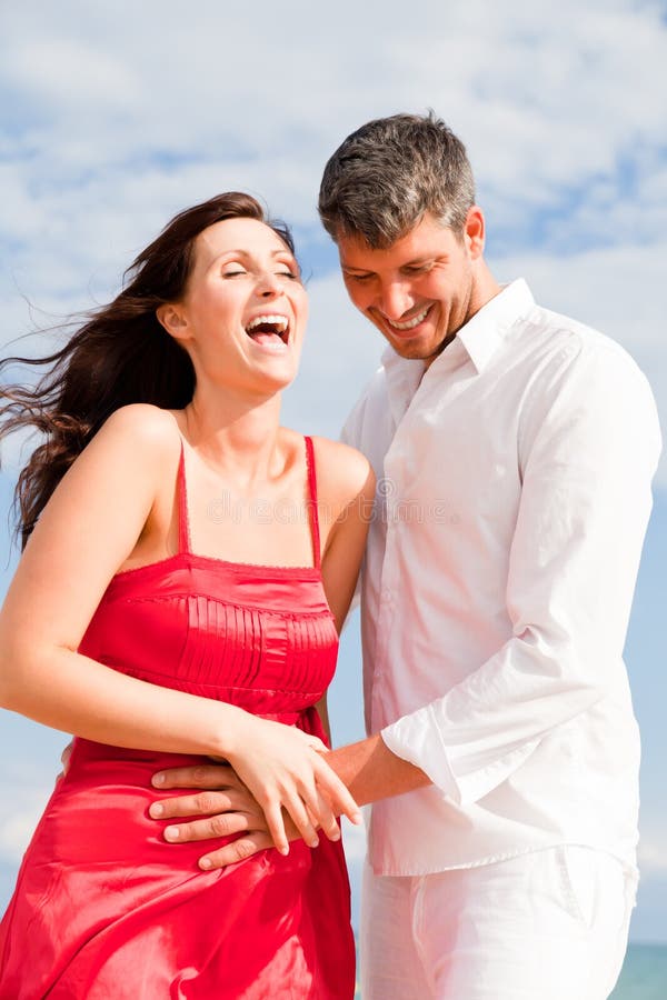 Positive beach couple