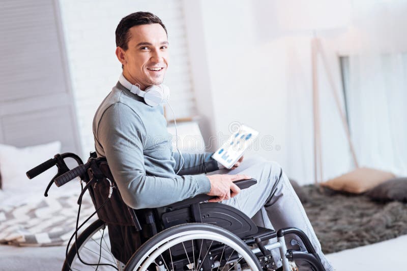 Positive brunette doing graph analysis royalty free stock photo