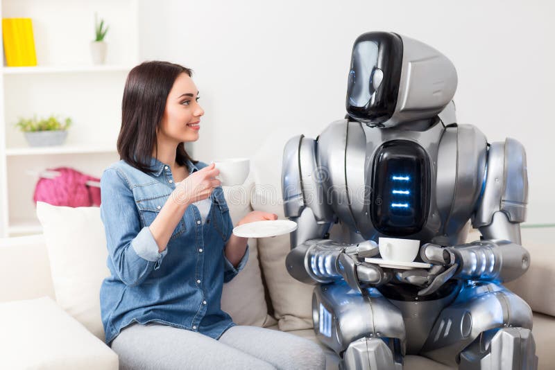 positive-girl-resting-couch-robot-spend-time-pleasure-cheerful-delighted-beautiful-drinking-coffee-having-70038718.jpg